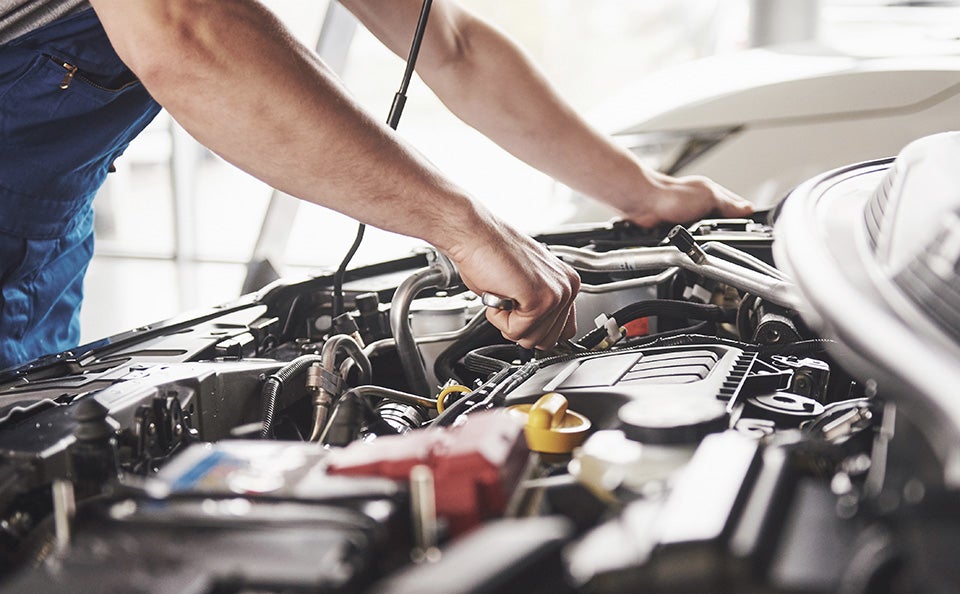 Navarre Service Technicians Evaluating Mechanical Assembly